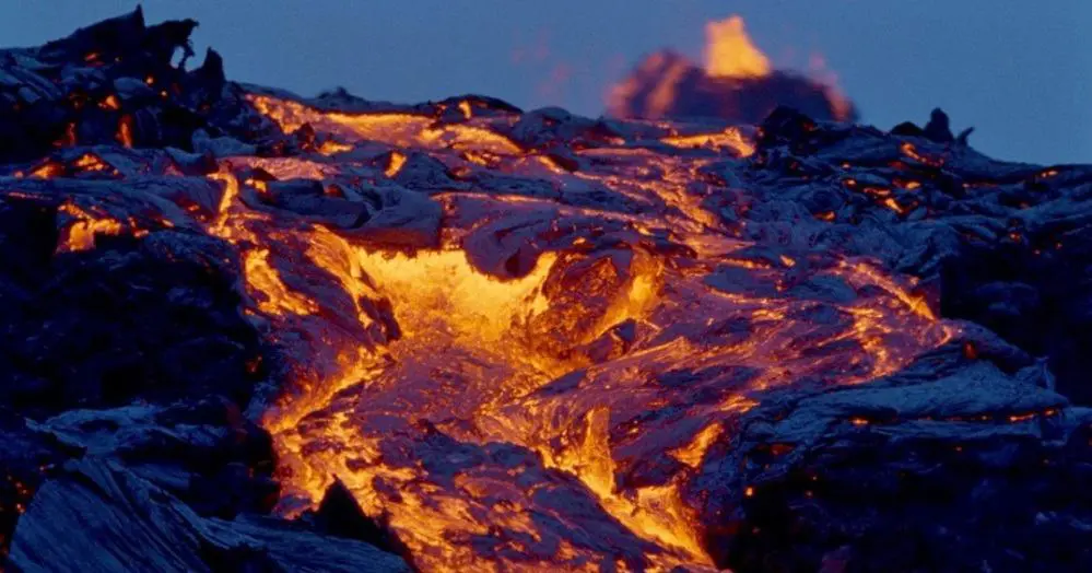 Lava spilling out of volcano.
